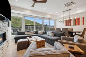 The living area of a Vail condo rental to stay at on a summer vacation.