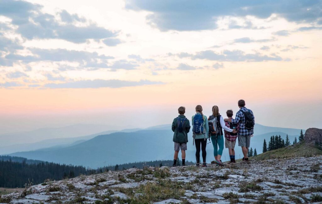 A group of people at the end of a Vail trail.